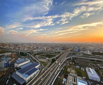 High angle view of cityscape against sky during sunset