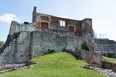 Low angle view of old building against sky