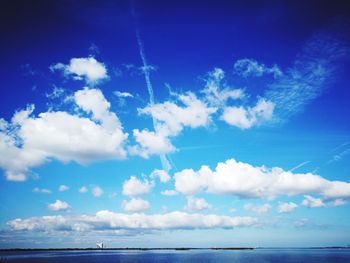 Scenic view of sea against blue sky