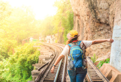 Rear view of person standing in park