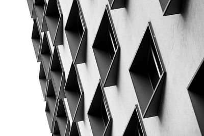 Low angle view of umbrellas on wall