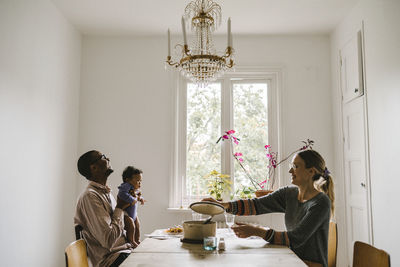 Parents with baby having meal