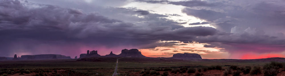 Panoramic view of storm clouds over land