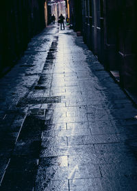 Narrow street in front of building