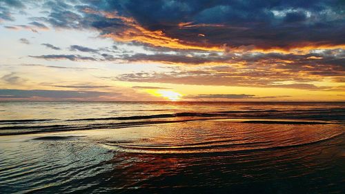 View of calm sea at sunset