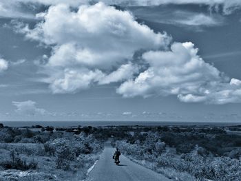 Scenic view of sea against cloudy sky