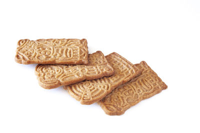 Close-up of cookies against white background