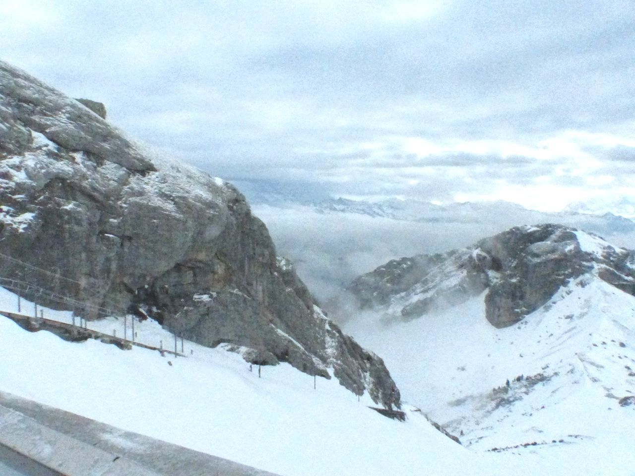 SCENIC VIEW OF MOUNTAINS AGAINST SKY DURING WINTER