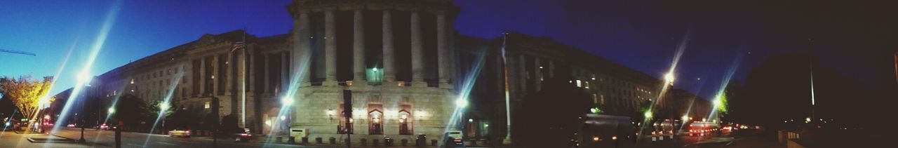 Low angle view of illuminated building at night