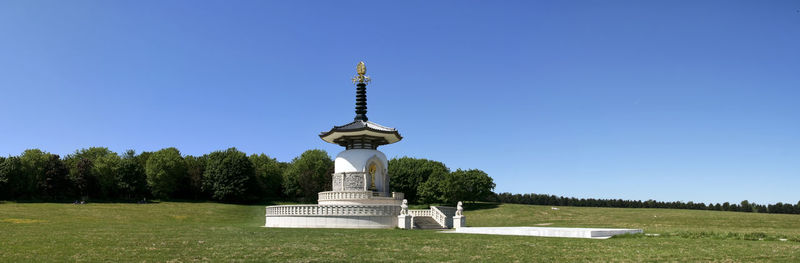 View of bell tower against blue sky