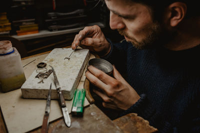 Midsection of man working