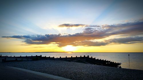 Scenic view of sea at sunset