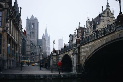 View of buildings in city during rainy season