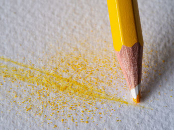 High angle view of yellow pencils on table