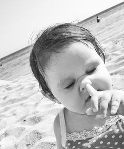 Close-up of boy on beach