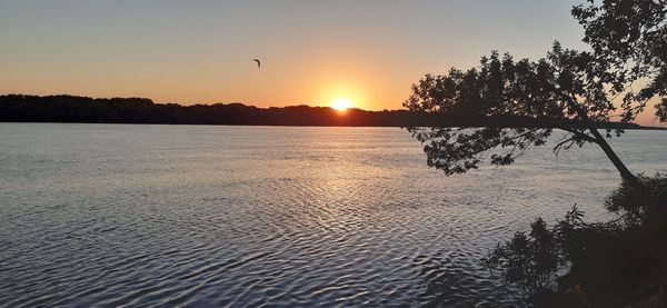 Scenic view of silhouette trees against sky during sunset