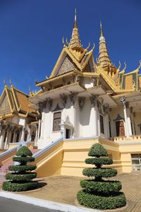 View of temple against building