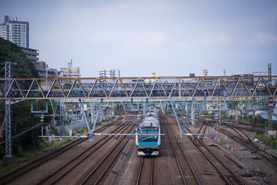 View of the train moving on the track during the day