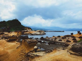 Scenic view of beach against sky