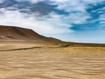 Scenic view of desert against sky