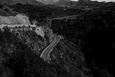 High angle view of winding road on landscape