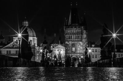 Illuminated charles bridge at night