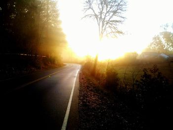 Empty road at sunset