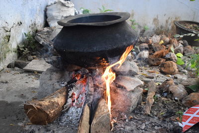 High angle view of bonfire on rocks