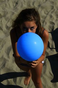 Close-up of girl holding toy