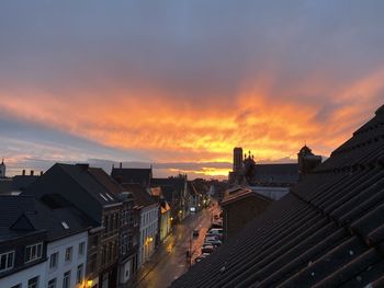 High angle view of buildings against sky during sunset