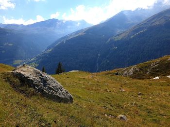 Scenic view of green landscape and mountains