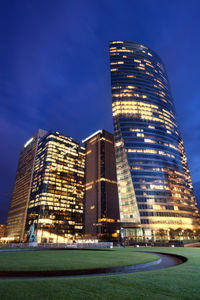 Illuminated buildings in city at night