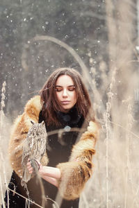 Full length of woman in snow