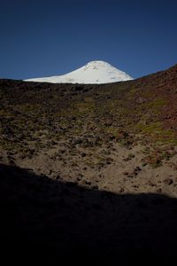 Scenic view of mountain against clear sky