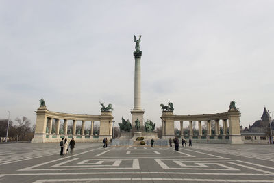 Group of people in front of historical building