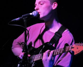 Woman playing guitar