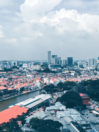 High angle view of buildings in city against sky