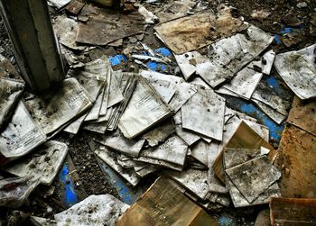 Close-up of abandoned objects on ground