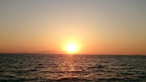 Scenic view of sea at sunset