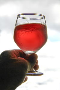 Close-up of hand holding drink