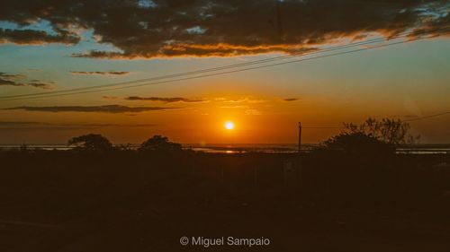 Scenic view of silhouette landscape against sky during sunset