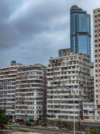 Buildings in city against sky