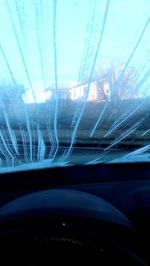 Close-up of illuminated car window during winter