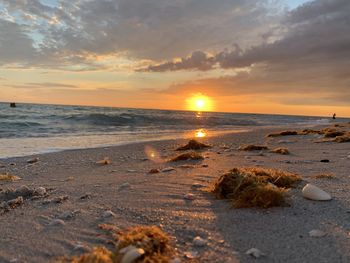 Scenic view of sea against sky during sunset