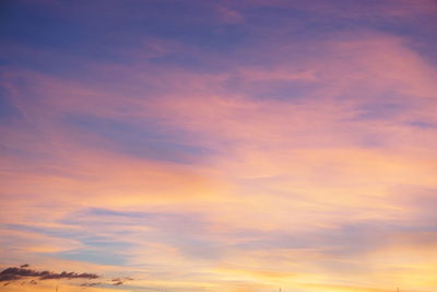 Low angle view of dramatic sky during sunset