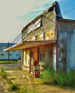 Abandoned building against sky