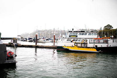 Boats in marina at harbor