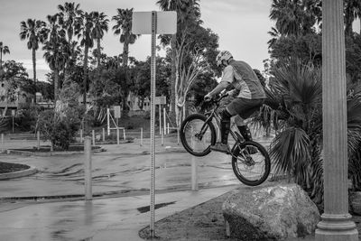 Man performing stunt on bmx bicycle