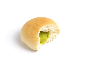 Close-up of bread against white background