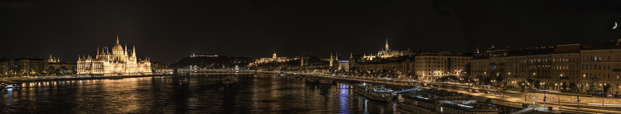 Illuminated buildings in city at night